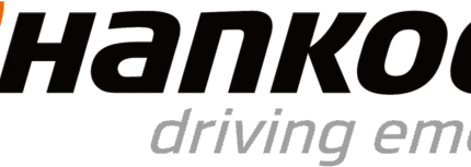 Hankook company logo featuring the brand name in bold black text with an orange emblem and the slogan 'driving emotion' beneath.
