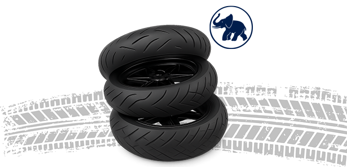 Three stacked motorcycle tires with tread patterns and Metzeler elephant logo in the background