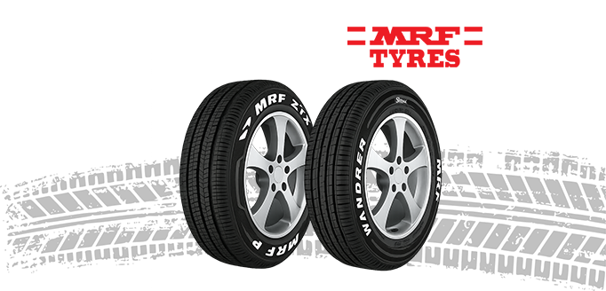 MRF ZTX and Wanderer car tires with alloy wheels and tread marks in the background